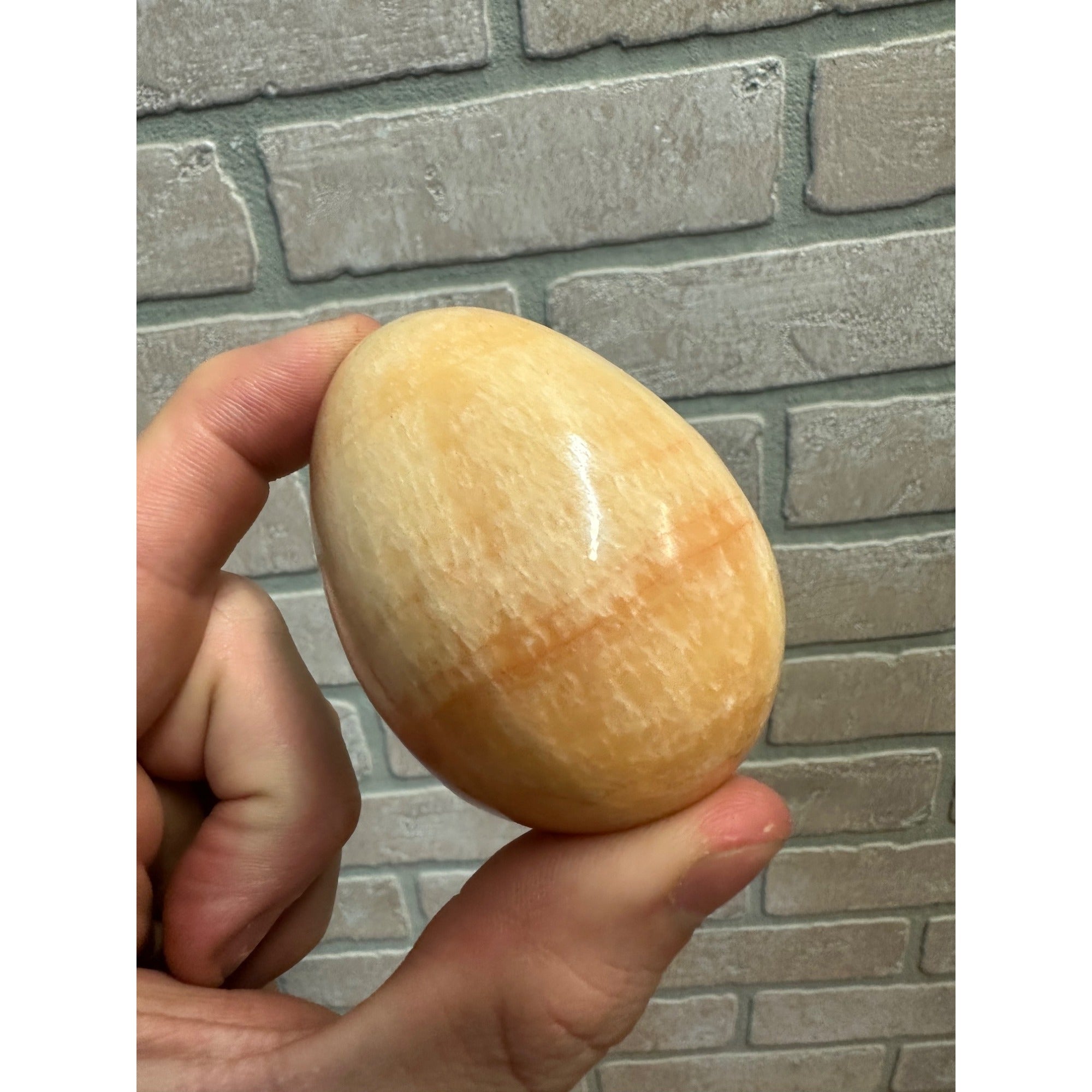 Orange Calcite Polished Mineral Specimen Egg Shaped 7.7oz