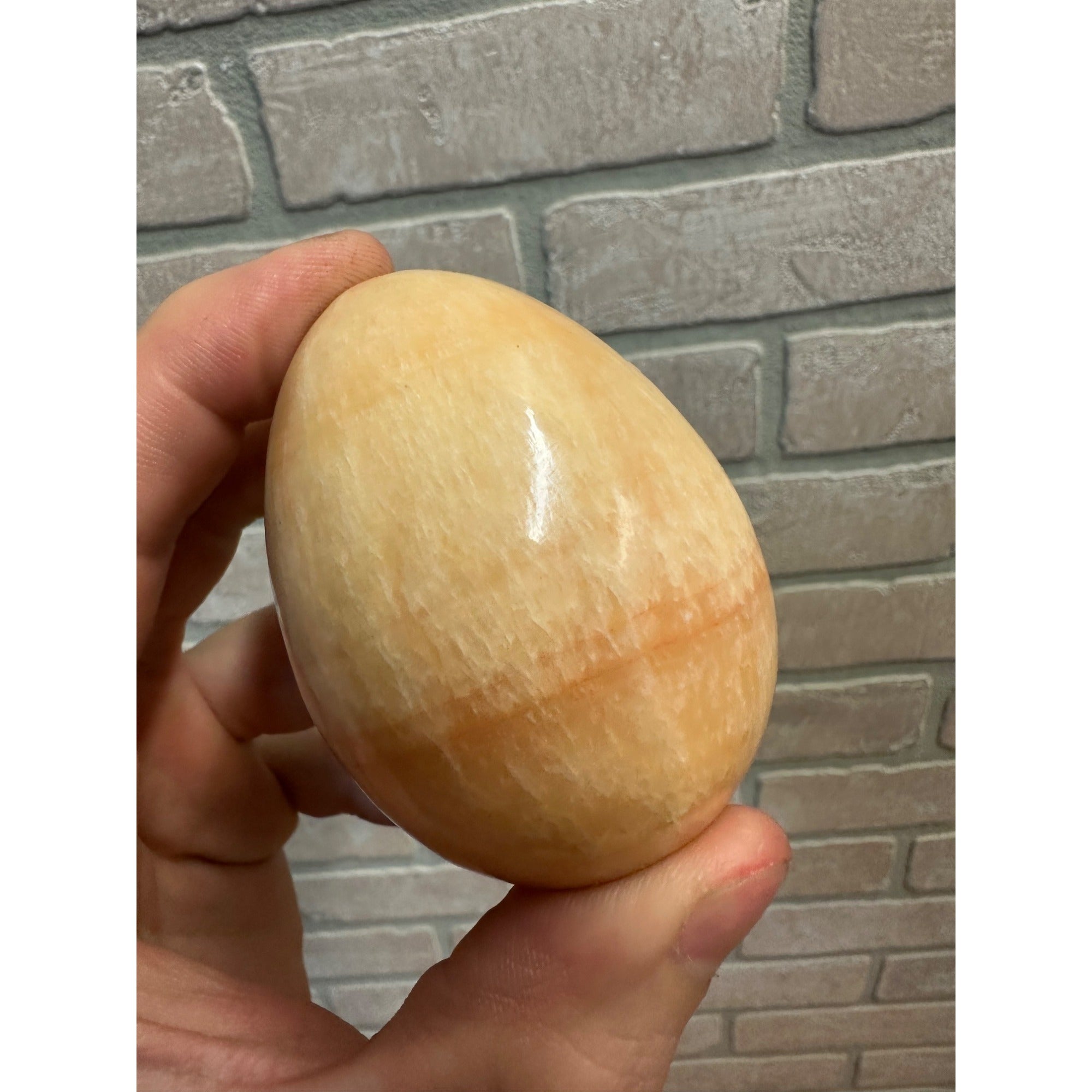 Orange Calcite Polished Mineral Specimen Egg Shaped 7.7oz