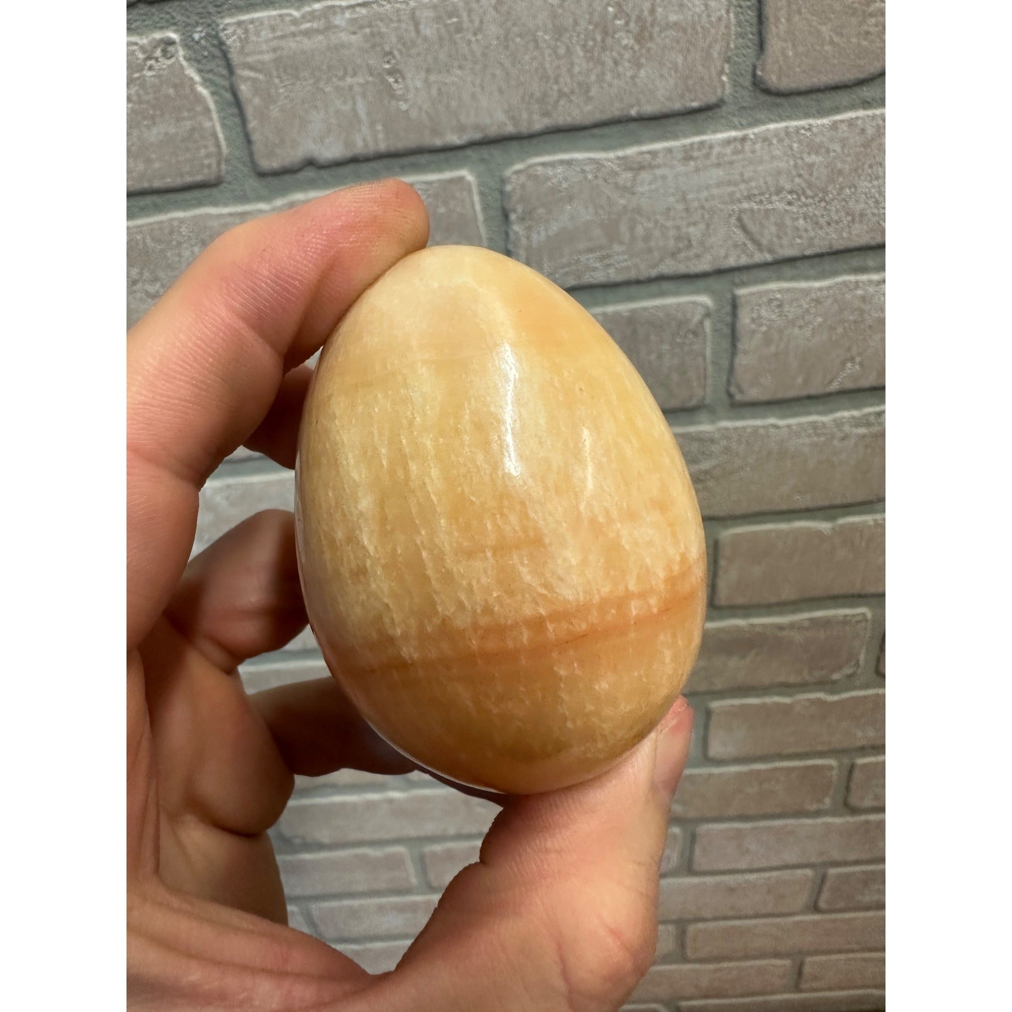 Orange Calcite Polished Mineral Specimen Egg Shaped 7.7oz