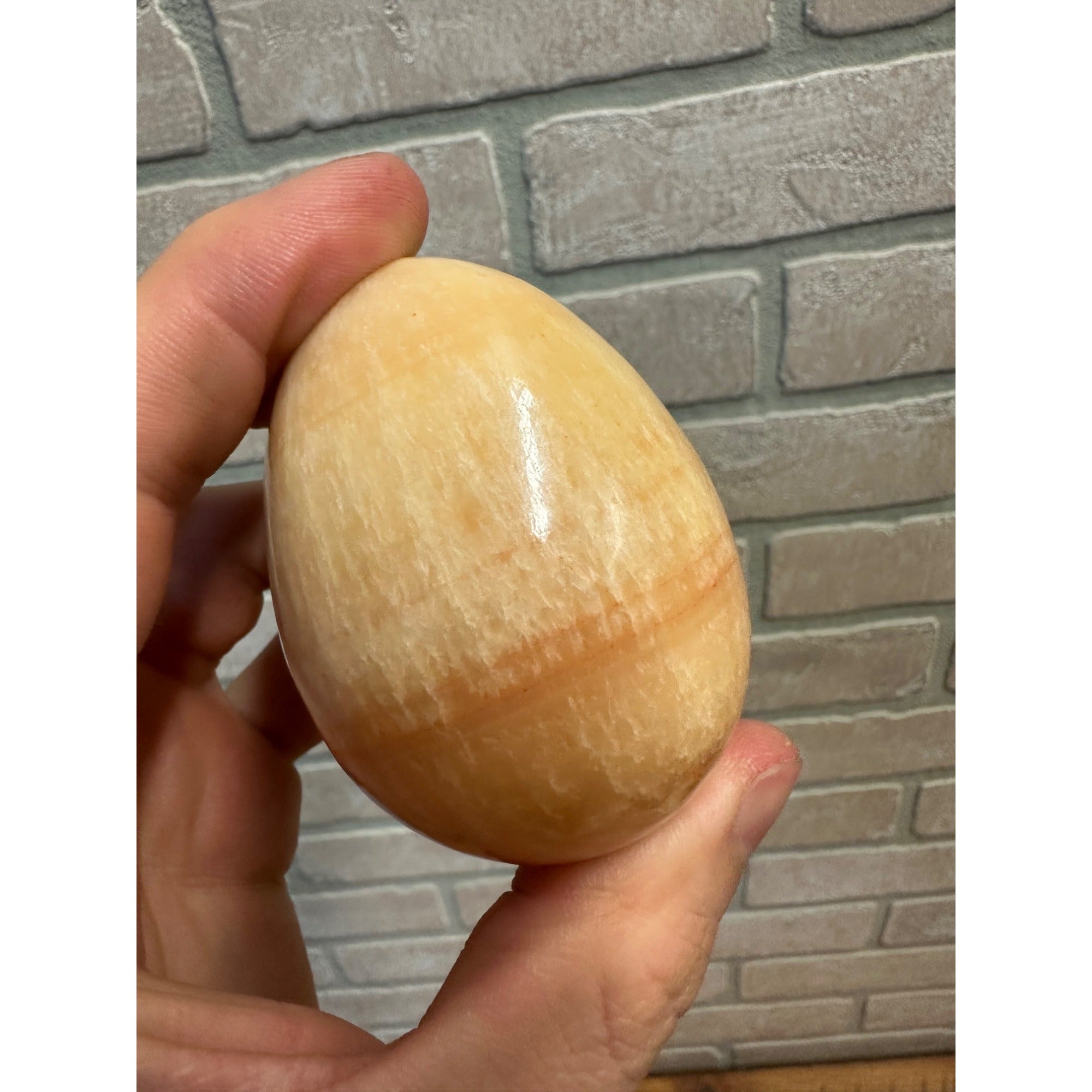 Orange Calcite Polished Mineral Specimen Egg Shaped 7.7oz