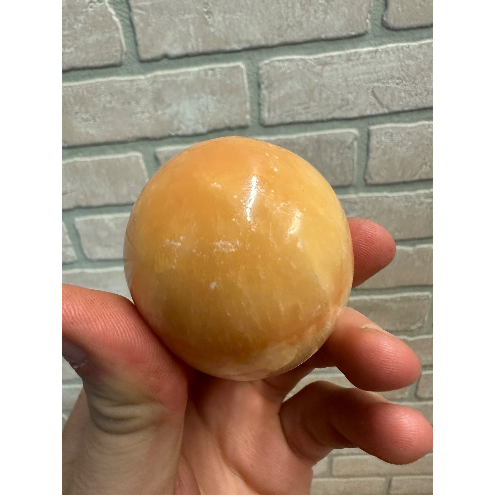 Orange Calcite Polished Mineral Specimen Egg Shaped 7.7oz